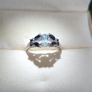 Elegant Sapphire And Topaz Ring